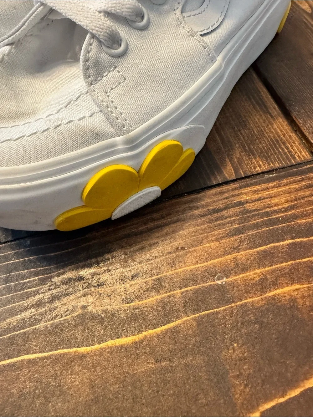 Vans White High-Top Canvas Sneakers with Yellow Logo Accent